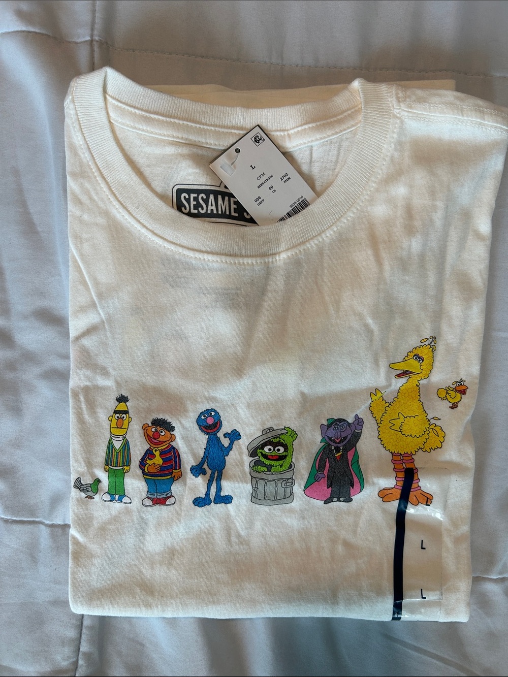 Sesame Street Ivory Short Sleeve Tee with Colorful Character Row